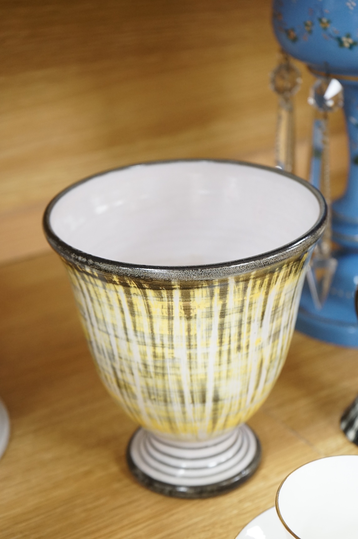 A collection of ceramics and glassware to include a lustre with drops, a bisque figure group and 19th century tea bowl and saucer